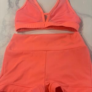 Vibrant Coral Sports Bra and Shorts Set